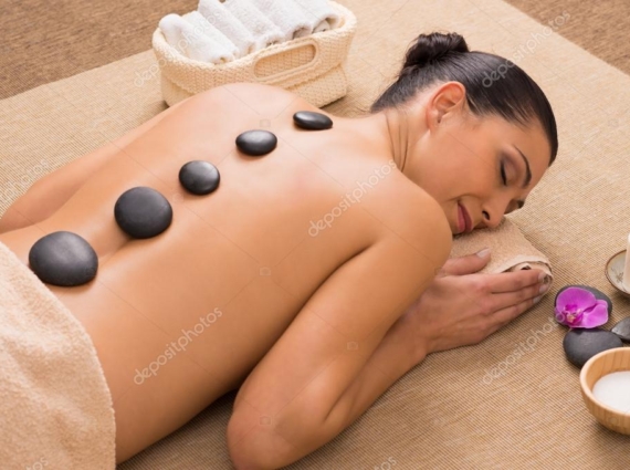 STONE MASSAGE_37107309-stock-photo-hot-stone-massage